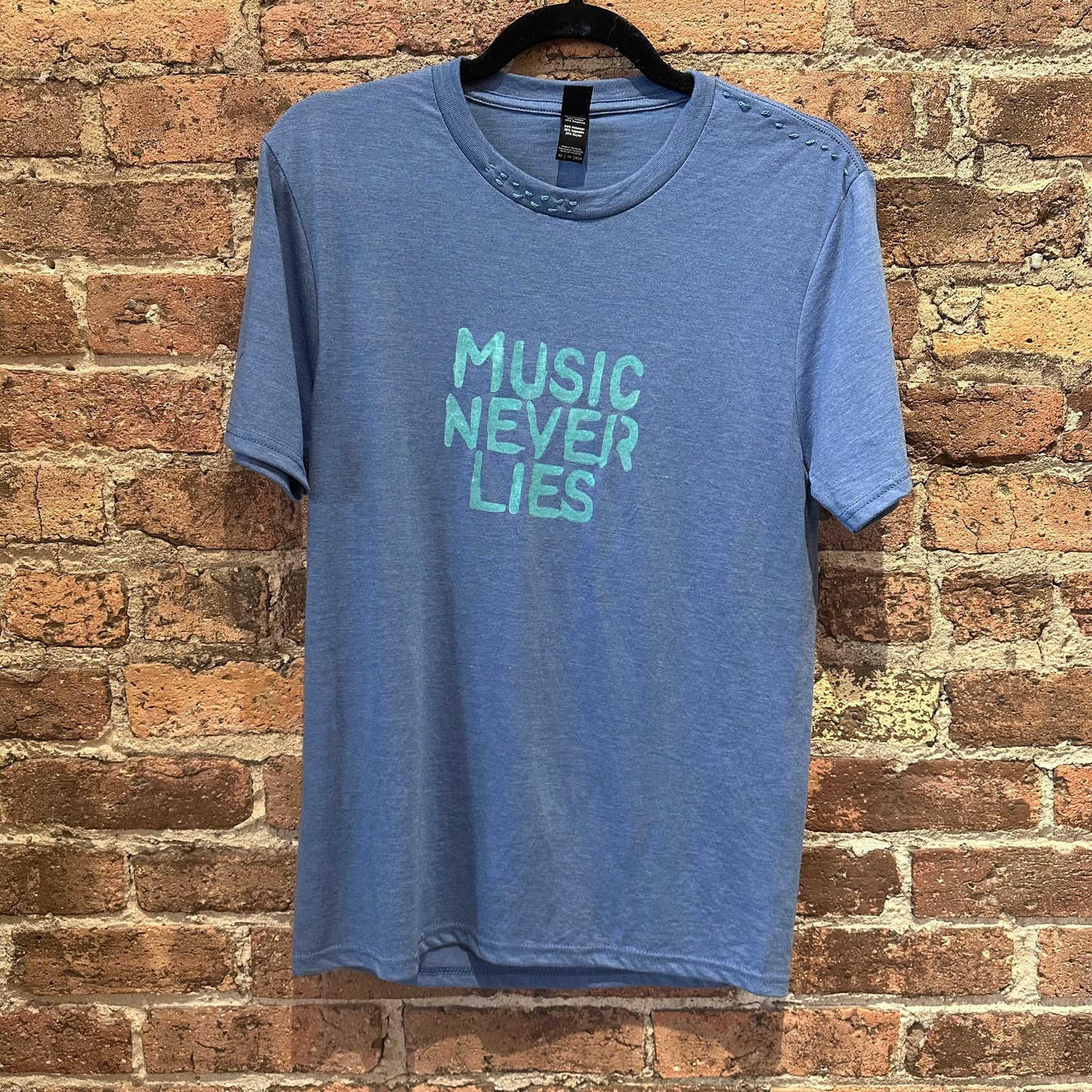 Gearhead Music Never Lies Lt Blue XS