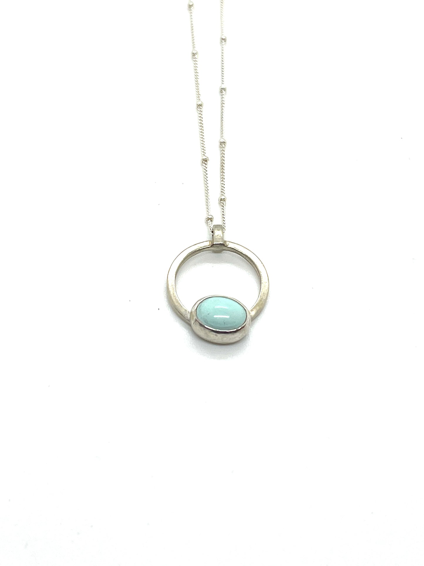 Tiny turquoise and sterling silver necklace